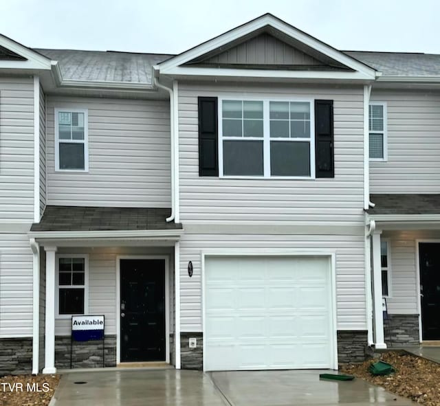 115 Raceday Center Dr Unit E-3, Bristol, TN 37620 - multi unit property with concrete driveway, roof with shingles, an attached garage, and stone siding