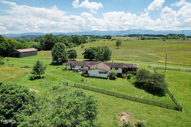 birds eye view of property featuring a rural view