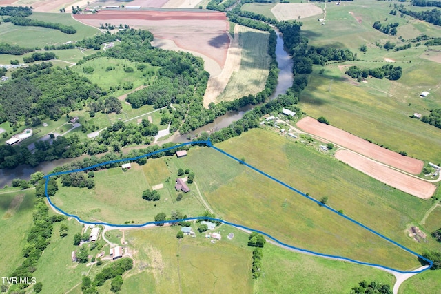 birds eye view of property featuring a rural view