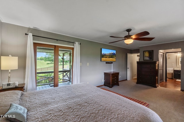 carpeted bedroom featuring access to outside, crown molding, and ceiling fan