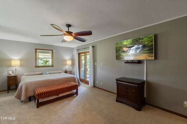 bedroom featuring multiple windows, carpet flooring, ceiling fan, and access to exterior