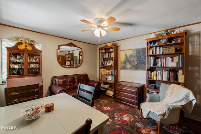 living room with ceiling fan and crown molding