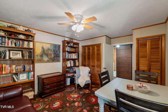 office space with ceiling fan, dark hardwood / wood-style flooring, and ornamental molding