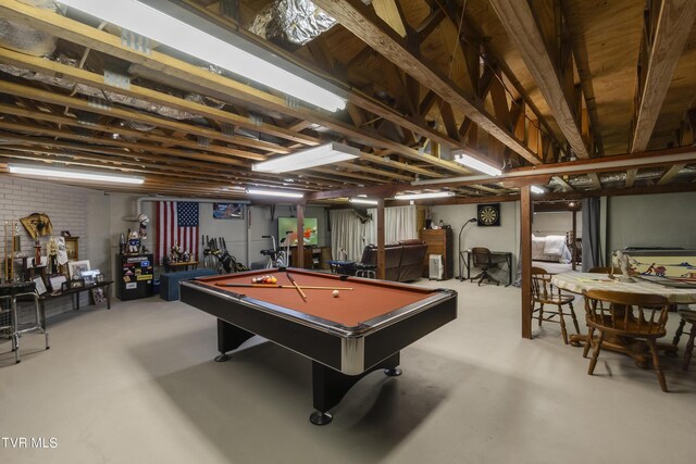 recreation room with billiards and concrete floors