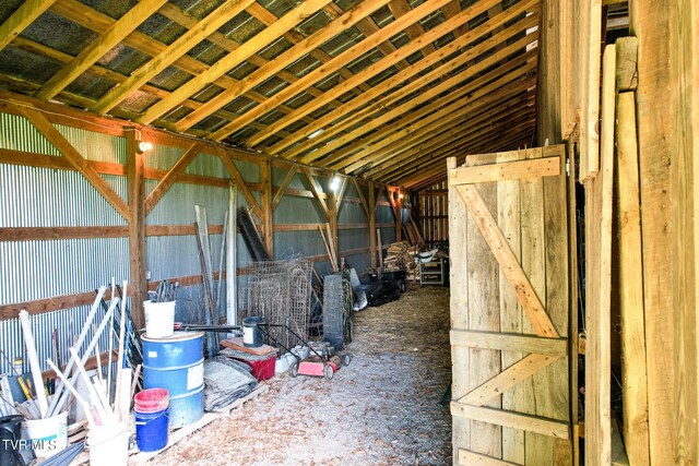 misc room featuring lofted ceiling