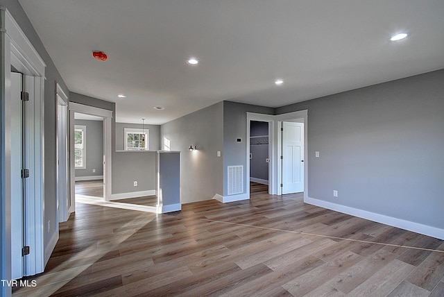 spare room with light wood-type flooring