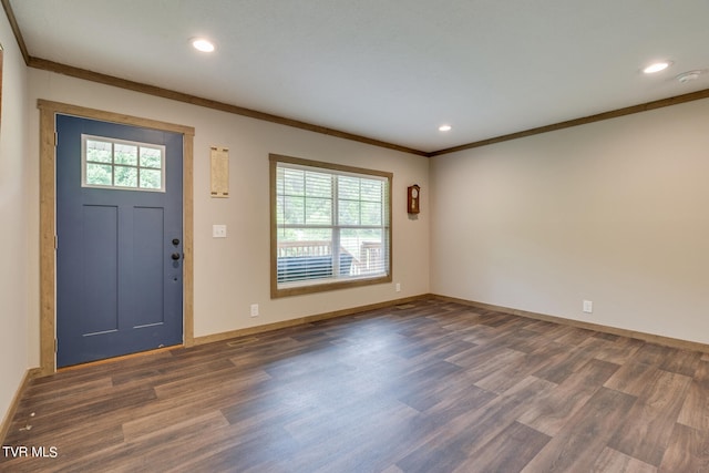 foyer featuring ornamental molding and dark wood-type flooring