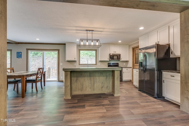 kitchen with white cabinets, black fridge with ice dispenser, and dark hardwood / wood-style flooring