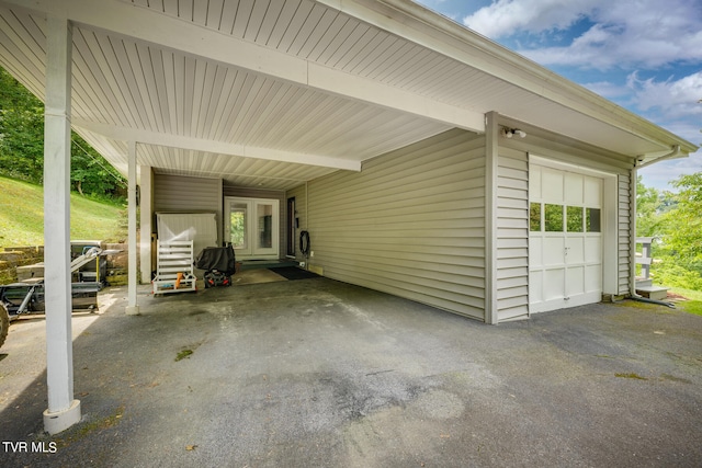 view of patio featuring a garage