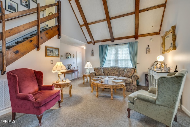 living room featuring carpet flooring, beamed ceiling, and high vaulted ceiling