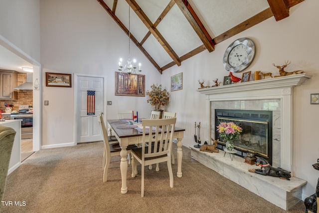 carpeted dining area featuring beamed ceiling, high vaulted ceiling, a fireplace, and a notable chandelier