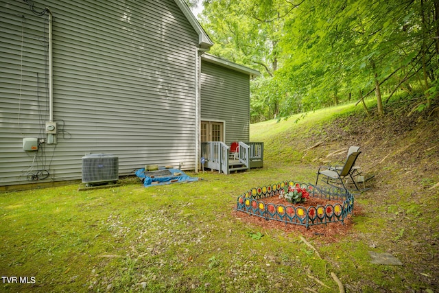 view of yard featuring central AC