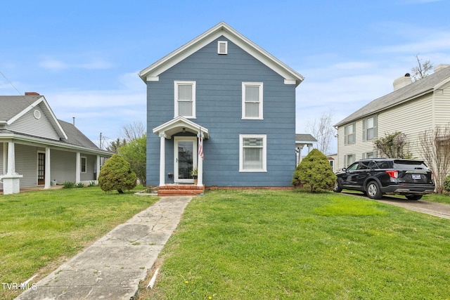 view of front property featuring a front lawn