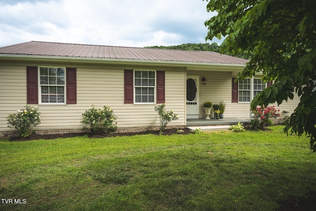 1466 Broad St, Elizabethton, TN 37643 - view of front facade with a front lawn, a porch, and metal roof