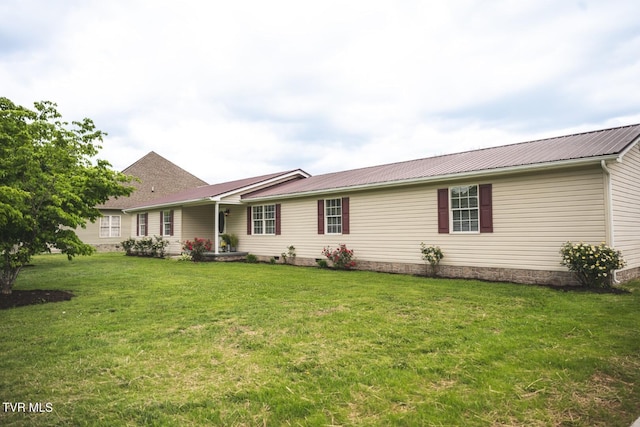 1466 Broad St, Elizabethton, TN 37643 - single story home with metal roof and a front lawn