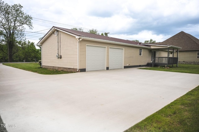 1466 Broad St, Elizabethton, TN 37643 - view of home's exterior with crawl space, an attached garage, metal roof, and a yard