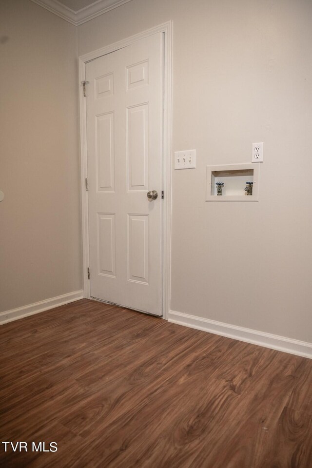 1466 Broad St, Elizabethton, TN 37643 - laundry room with washer hookup, ornamental molding, dark wood finished floors, baseboards, and laundry area