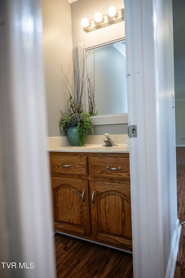 1466 Broad St, Elizabethton, TN 37643 - bathroom featuring vanity and wood finished floors