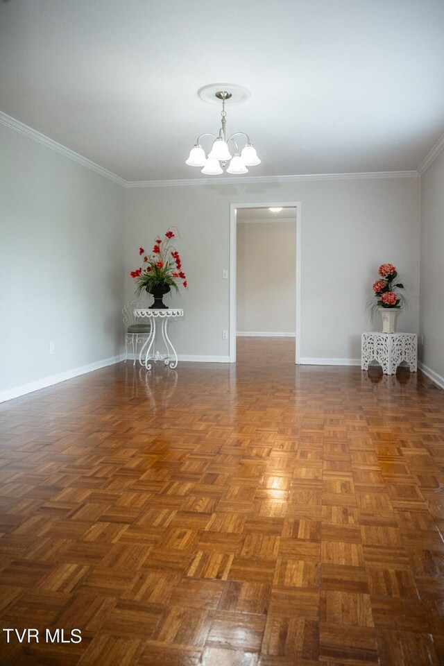 1466 Broad St, Elizabethton, TN 37643 - empty room featuring ornamental molding, baseboards, and a chandelier