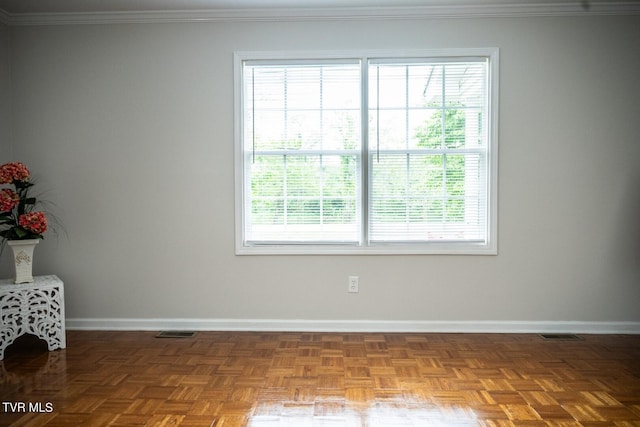 1466 Broad St, Elizabethton, TN 37643 - spare room featuring crown molding, baseboards, and visible vents