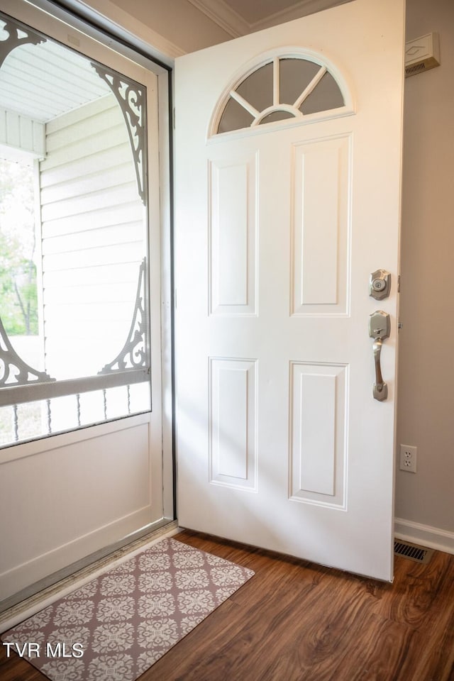 1466 Broad St, Elizabethton, TN 37643 - interior space featuring visible vents, baseboards, and wood finished floors