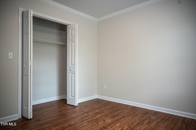 1466 Broad St, Elizabethton, TN 37643 - unfurnished bedroom with a closet, baseboards, dark wood-type flooring, and ornamental molding