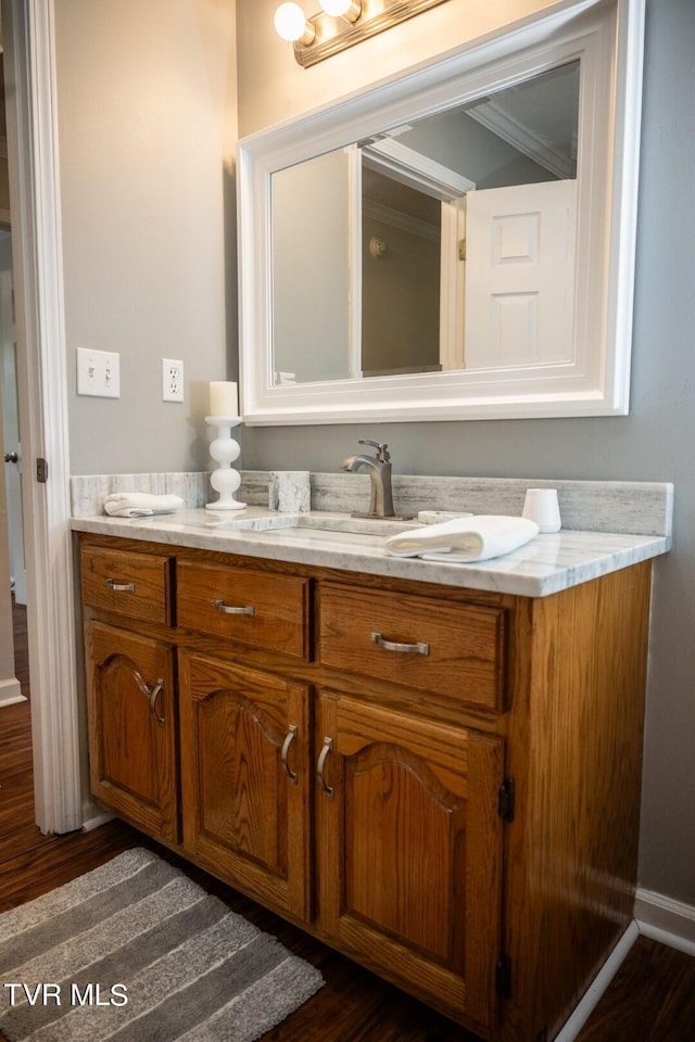1466 Broad St, Elizabethton, TN 37643 - bathroom with double vanity and wood finished floors