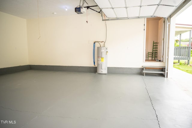 1466 Broad St, Elizabethton, TN 37643 - garage featuring a garage door opener, baseboards, and electric water heater