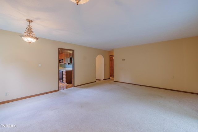 unfurnished room featuring carpet floors