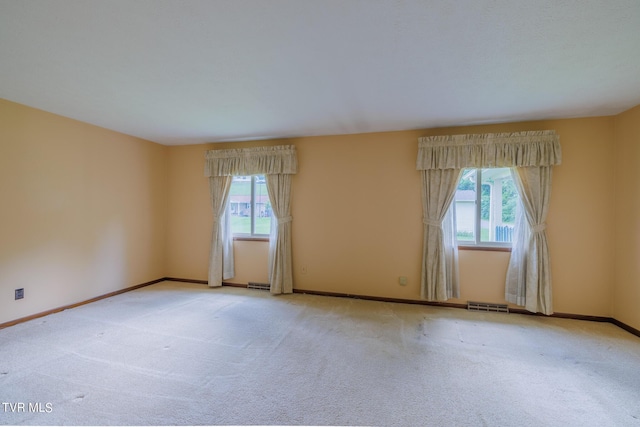 view of carpeted spare room