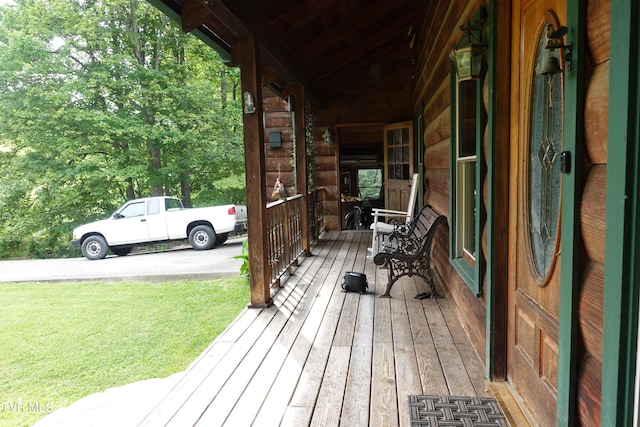 wooden terrace with covered porch