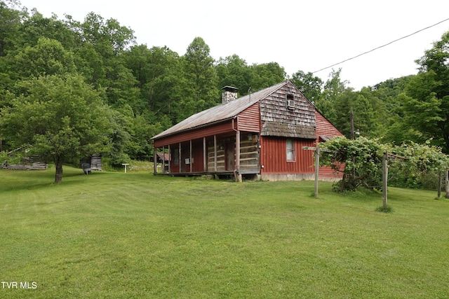 exterior space with a yard