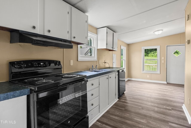 kitchen with light hardwood / wood-style floors, electric range, black dishwasher, lofted ceiling, and white cabinetry