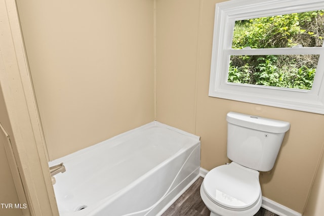 bathroom featuring toilet and wood-type flooring