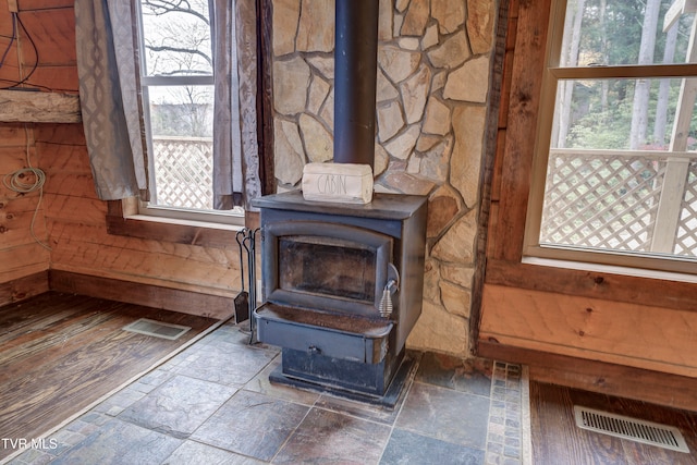 interior details featuring a wood stove