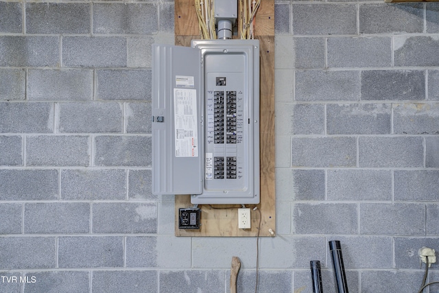 utility room featuring electric panel