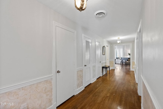 hallway featuring dark hardwood / wood-style floors