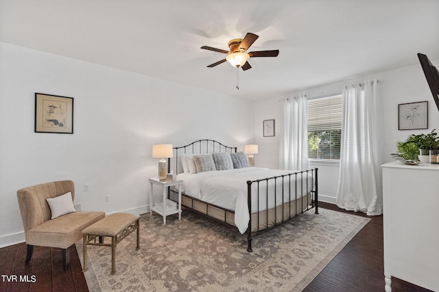 bedroom with hardwood / wood-style flooring and ceiling fan