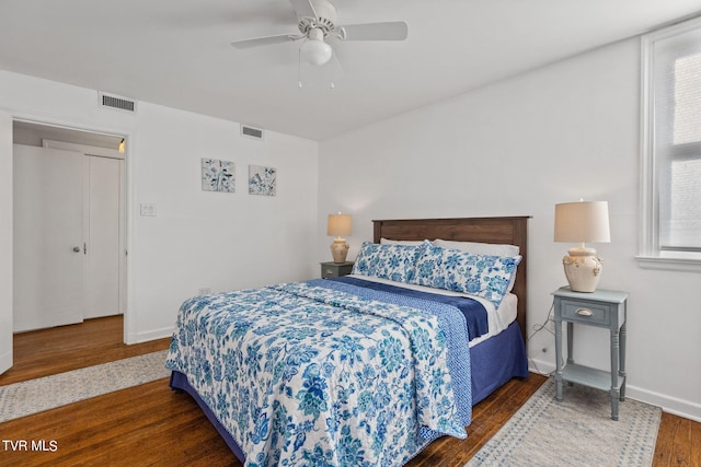 bedroom featuring hardwood / wood-style flooring and ceiling fan