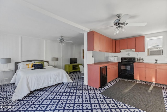 bedroom featuring sink and ceiling fan