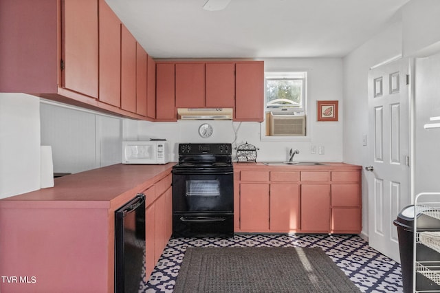 kitchen featuring black / electric stove and sink