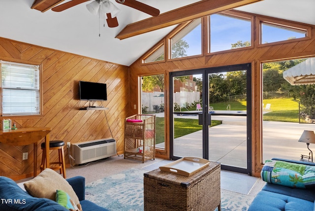 sunroom / solarium with lofted ceiling with beams and ceiling fan