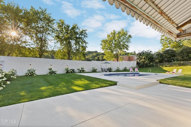 view of patio / terrace featuring a fenced in pool