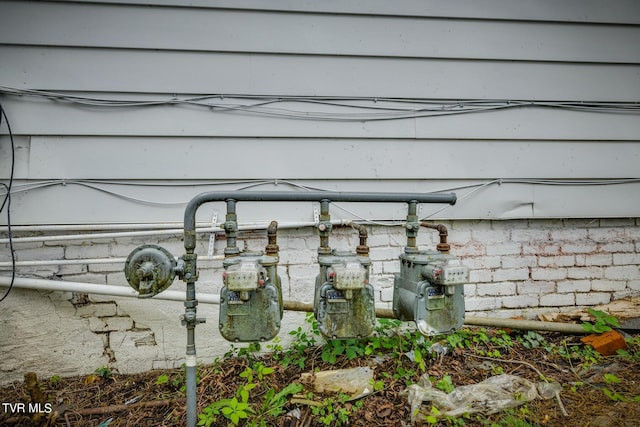 exterior details featuring gas meter