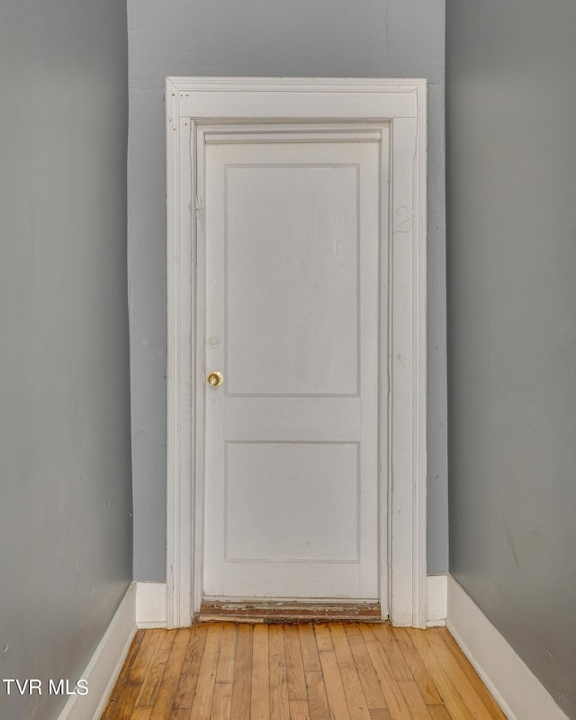 room details featuring wood finished floors and baseboards