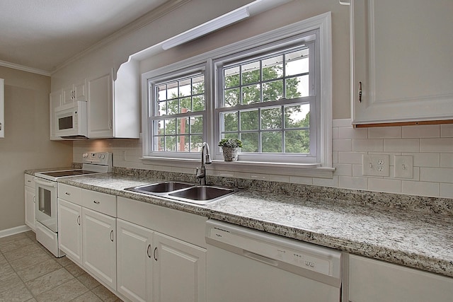 kitchen with sink, white cabinetry, ornamental molding, white appliances, and decorative backsplash