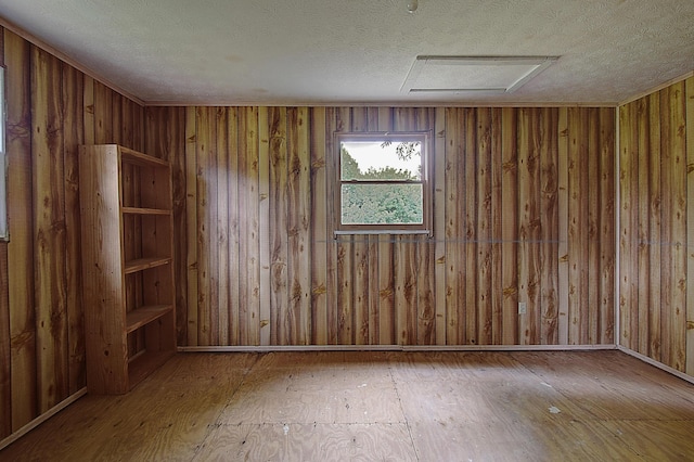 empty room with a textured ceiling