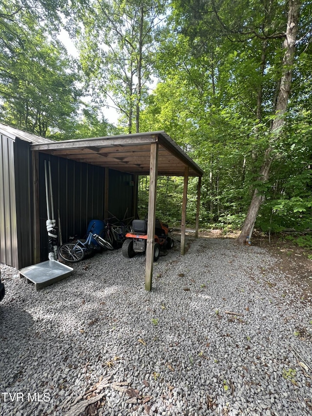 view of yard with a carport