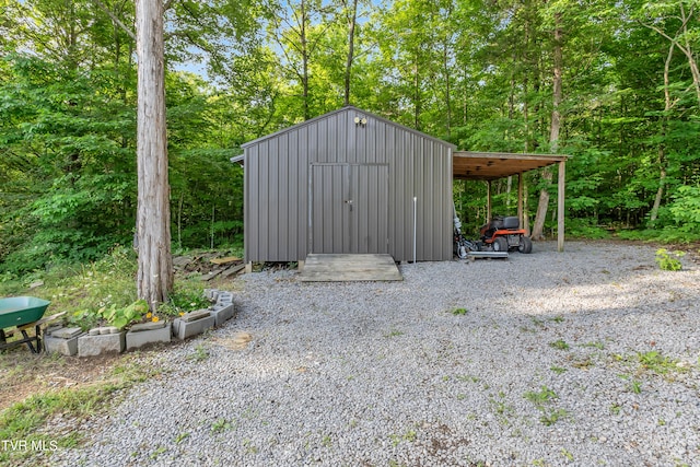 view of shed / structure featuring a carport