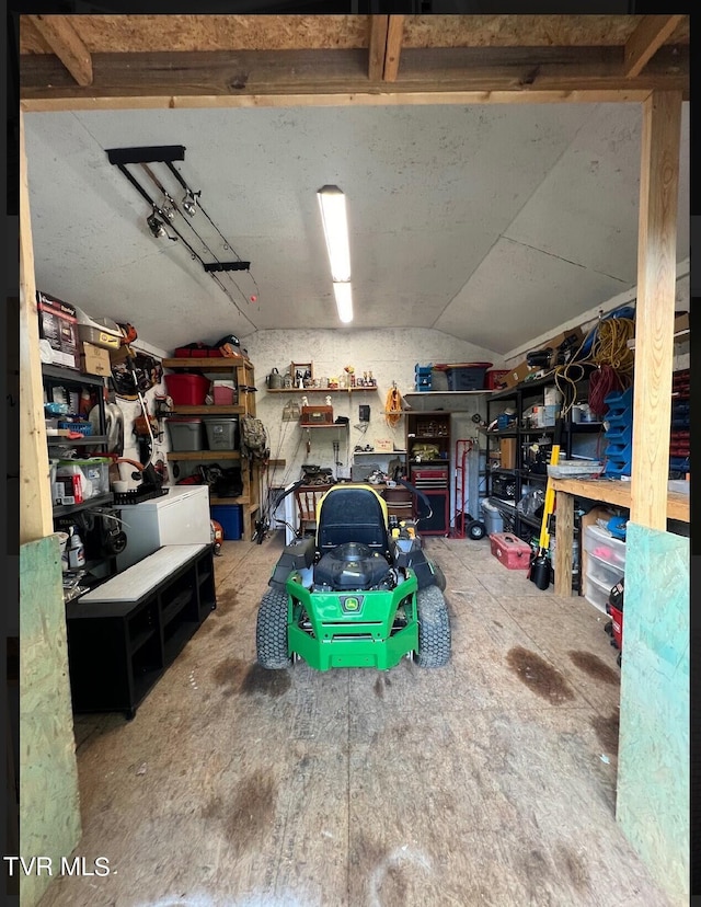 garage featuring a workshop area